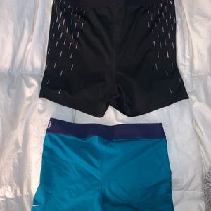 Two pairs of medium Nike pros - great condition